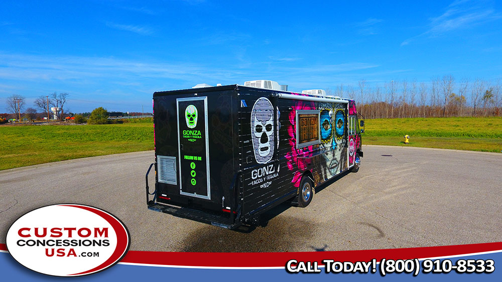 black food truck with brightly colored day of the dead designs