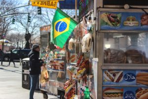 man browsing food truck options