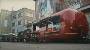 red food truck parked on a city street